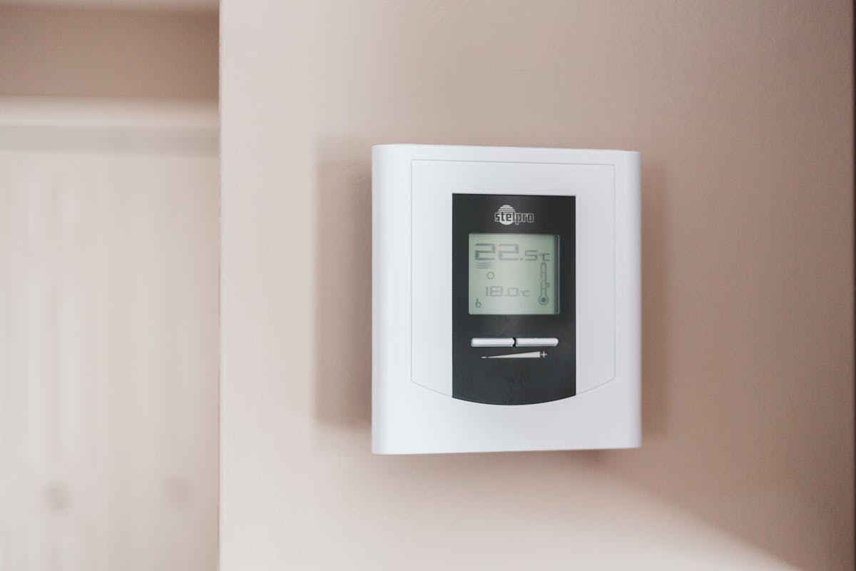 Maryland family reviewing energy bill — savings from clean HVAC and ductwork